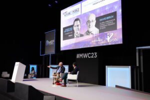 David and Andrew Bud sat in chairs on stage during their fireside chat