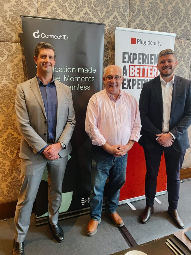 Dave and others posing for photo at the digital identity event