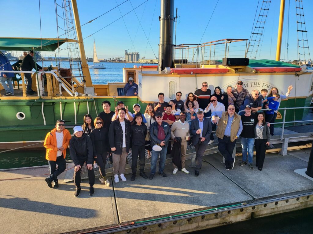 Picture of everyone who took part in the Fintech cruise in front of the boat The William The Fourth