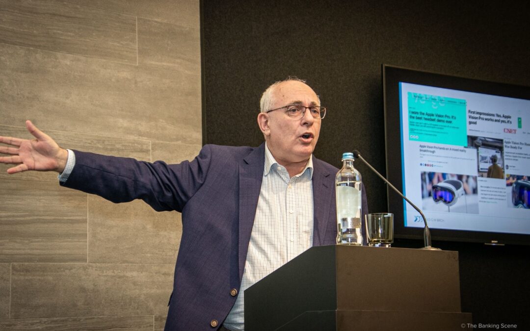David Birch presenting on stage at the Banking Scene BBQ event