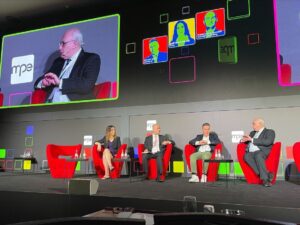 Dave on stage with fellow panellists
