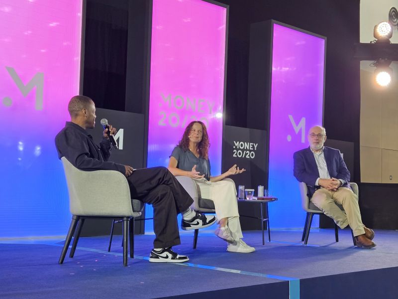 Image of panellists on stage for the From Pixels to Profits: Monetizing the Metaverse - Opportunities and Challenges