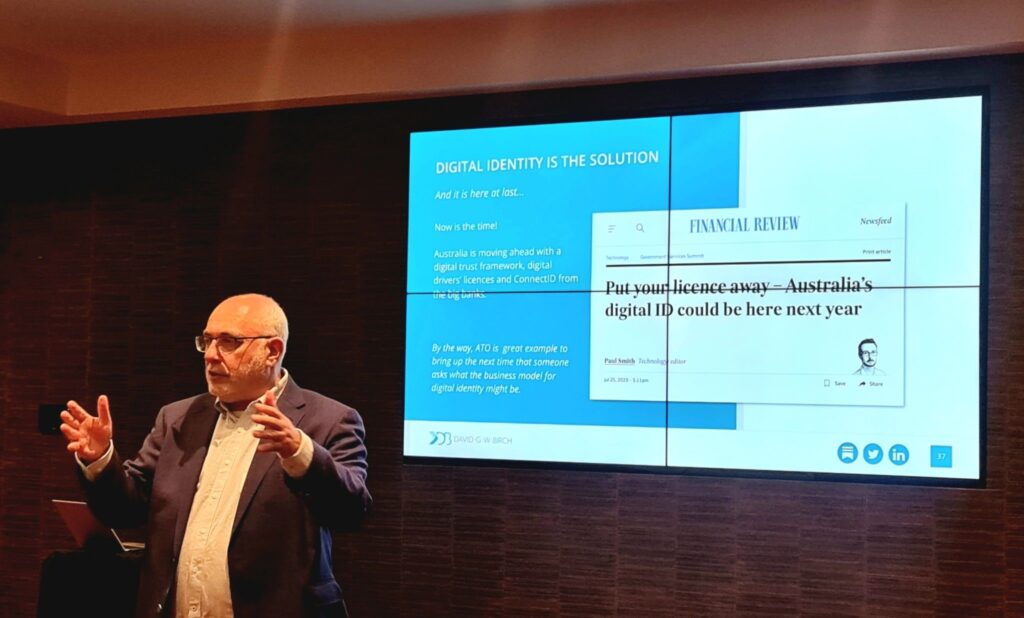 Image of David Birch presenting with a slide shown in the background entitled Digital Identity at the Payments NZ Strategy Session