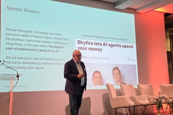 David Birch on stage at the Fime Domestic Scheme event presenting on Agentic Commerce